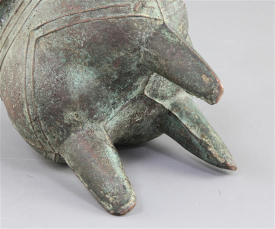A Chinese archaic bronze tripod ritual vessel, Liding, 12th-11th century B.C., 17.5cm high